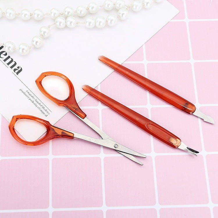 TheGromify Professional Manicure and Pedicure Tool Set with orange handles and silver metal tips. Includes scissors, cuticle pusher, and tweezers.