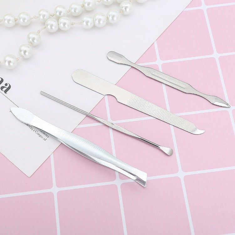 TheGromify Professional Manicure and Pedicure Tool Set includes tweezers, nail file, cuticle pusher, and cuticle trimmer. Stainless steel.