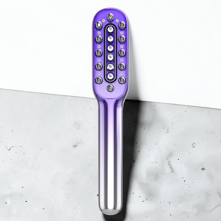 TheGromify vibrating red light hair growth comb with serum delivery system for scalp stimulation and hair regrowth.